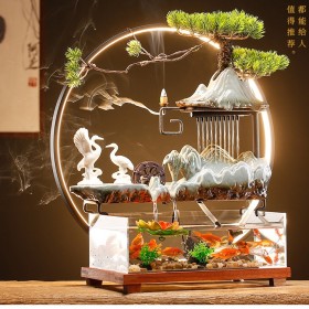 نافورة مع حوض سمك مع اضاءة